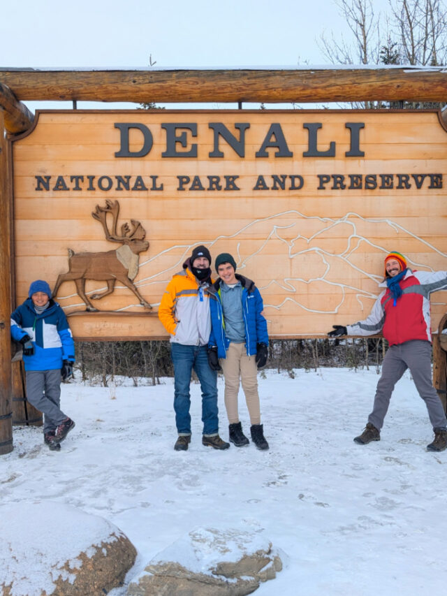 Full Taylor Family at entrance sign Denali National Park in winter Alaska 1