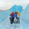 Full Taylor Family on Icebergs in Frozen Lake at Knik Glacier with Alaska Backcounty Adventures UTV Winter Tour Palmer Alaska 2