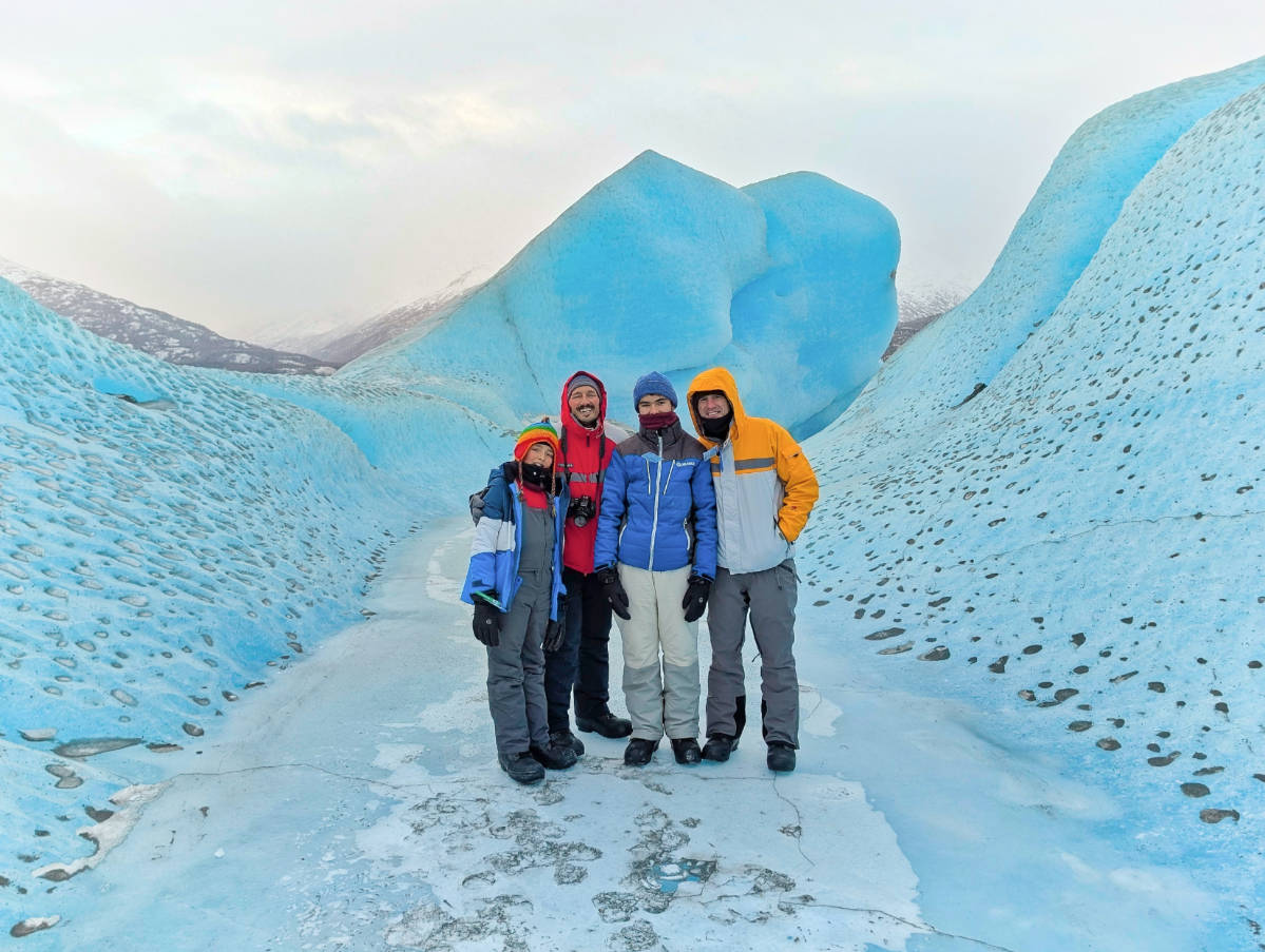 Full Taylor Family on Icebergs in Frozen Lake at Knik Glacier with Alaska Backcounty Adventures UTV Winter Tour Palmer Alaska 2