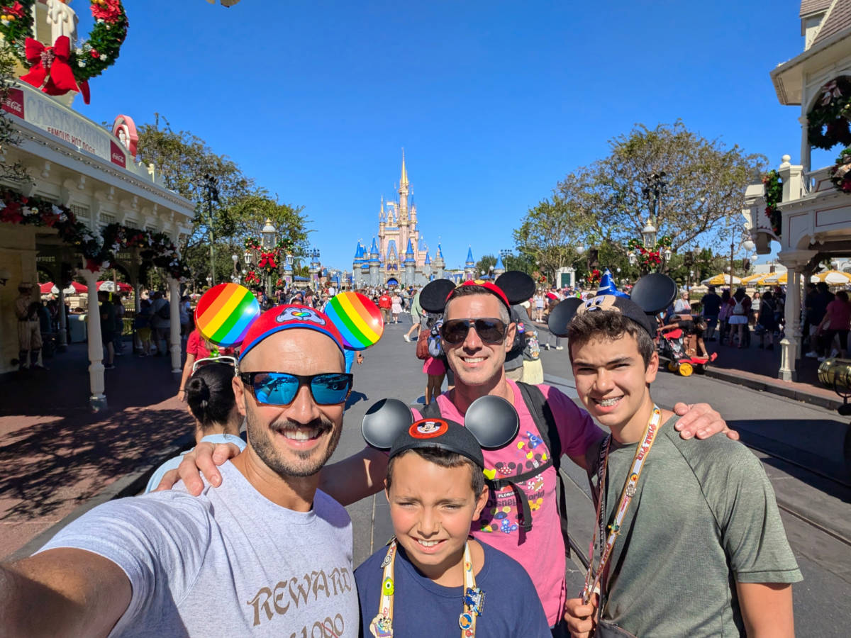 Full Taylor family with Mickey Ears at Cinderella Castle in Magic Kingdom Walt Disney World Orlando 1