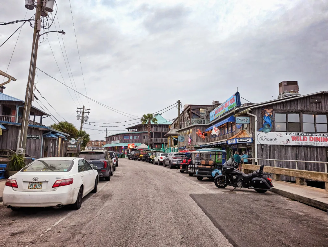 Golf Carts on Dock Street Downtown Cedar Key Gulf Coast Florida 1