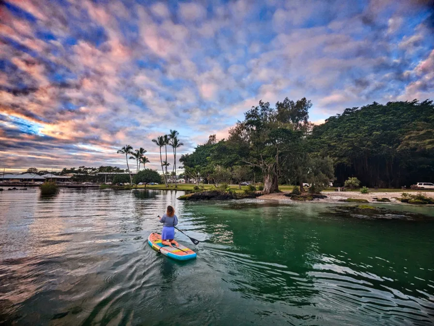 Kelly on SUP at Sunrise on Rieds Bay Hilo Big Island Hawaii 1