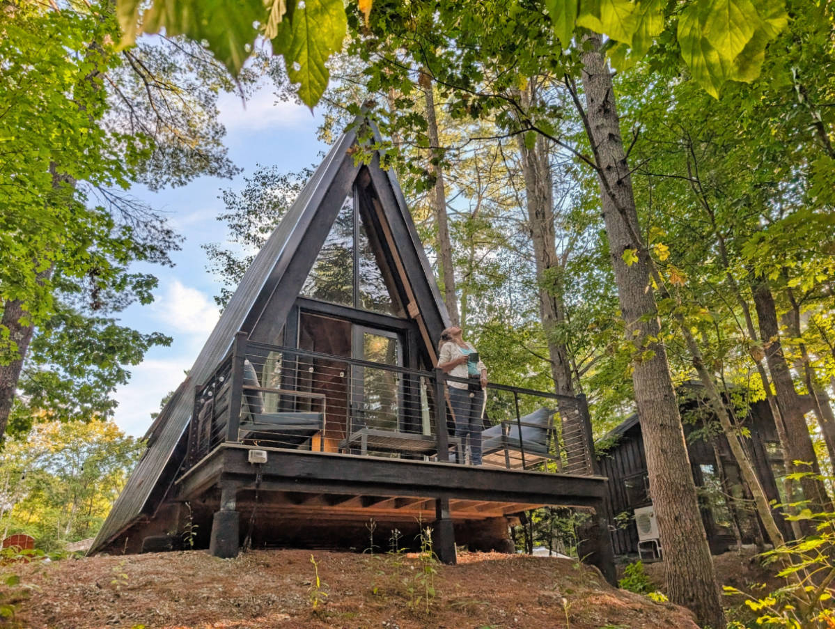Kelly with A Frame cabin at Desert of Maine Glamping Freeport Maine 3