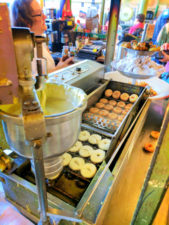 Mini doughnut stand in Pike Place Market Seattle 1