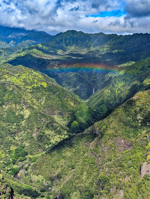 Rainbow over Jurassic Park Waterfall from Air Kauai Doors Off Helicopter Tour Kauai Hawaii 1