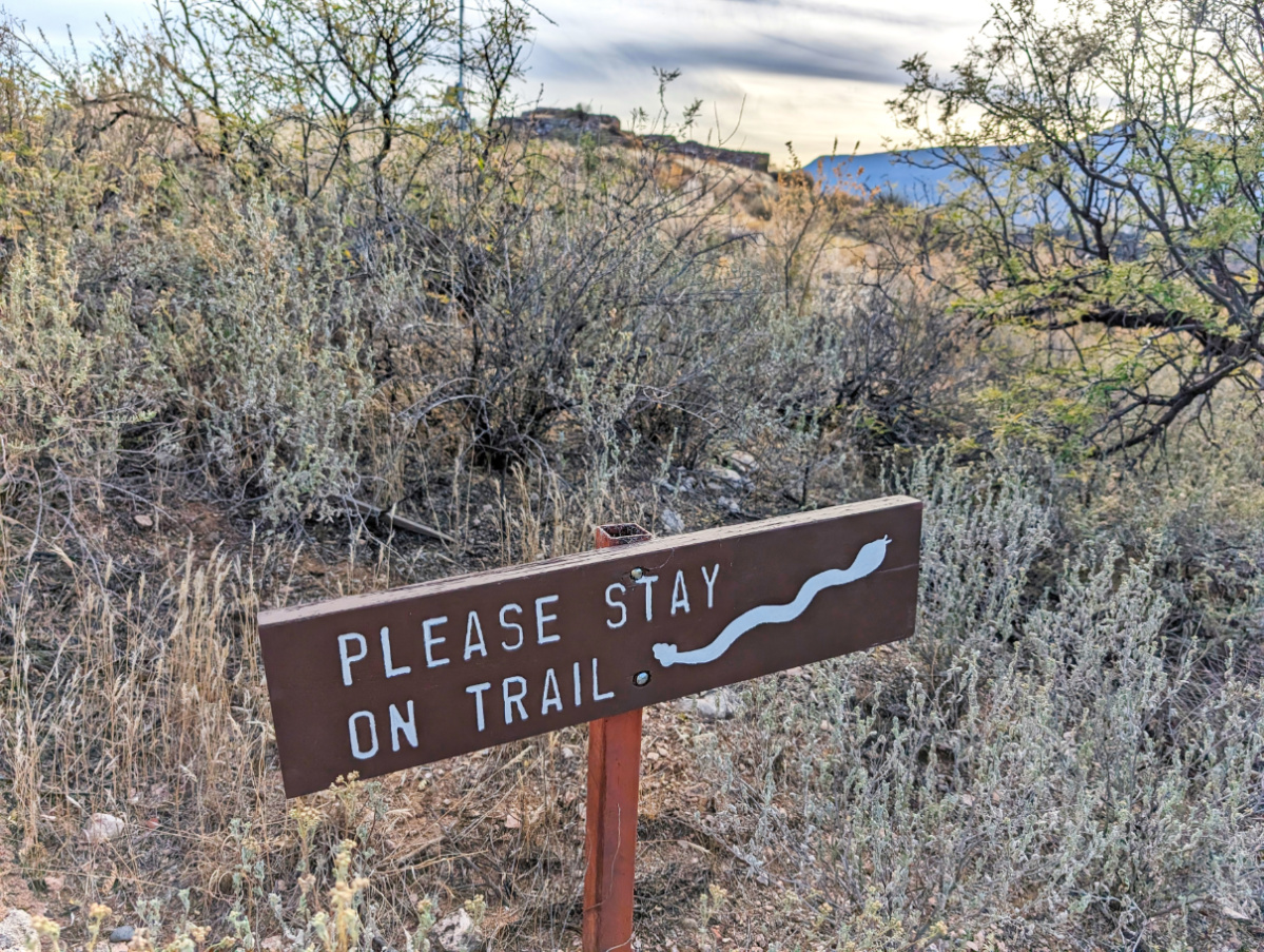 Rattlesnake warning sign at Toozigut National Monument Arizona 1