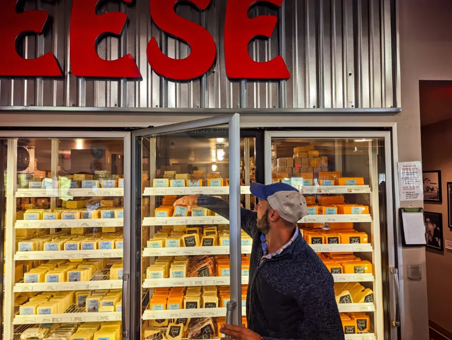 Rob Taylor Buying Cheese at Cheese Shop Door County Wisconsin 3