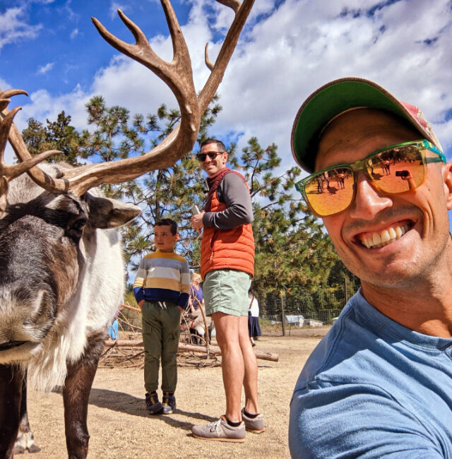Rob Taylor and Family Doing Reindeer Selfie at Reindeer Farm Leavenworth Washington 2