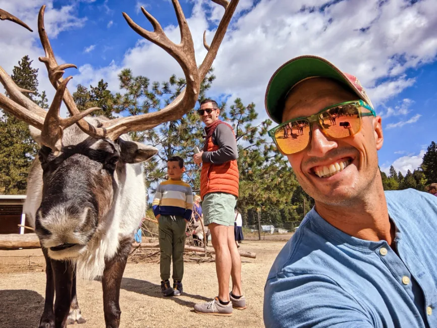 Rob Taylor and Family Doing Reindeer Selfie at Reindeer Farm Leavenworth Washington 2