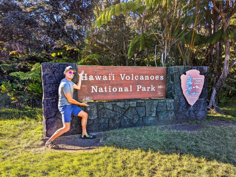 Rob Taylor at Entrance Sign to Hawaii Volcanoes National Park Big Island 2
