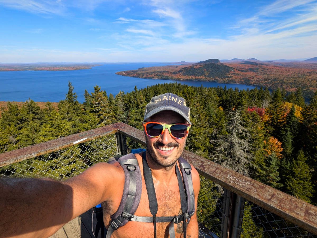 Rob Taylor at top of Watchtower in Mount Kineo State Park Moosehead Lake Greenville Maine