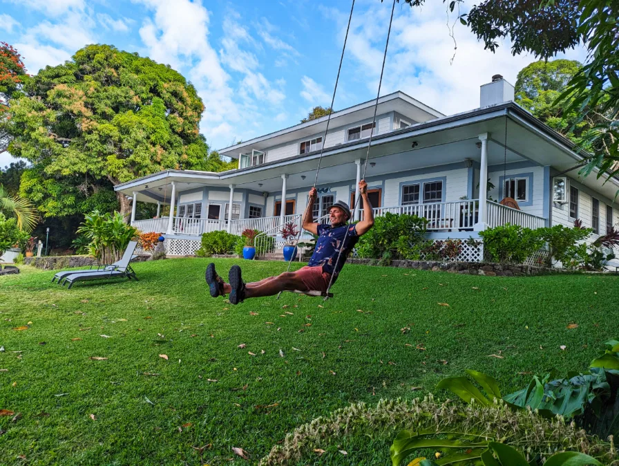 Rob Taylor on swing at Kaawa Loa Plantation Bed and Breakfast Captain Cook Kona Coast Big Island Hawaii 1