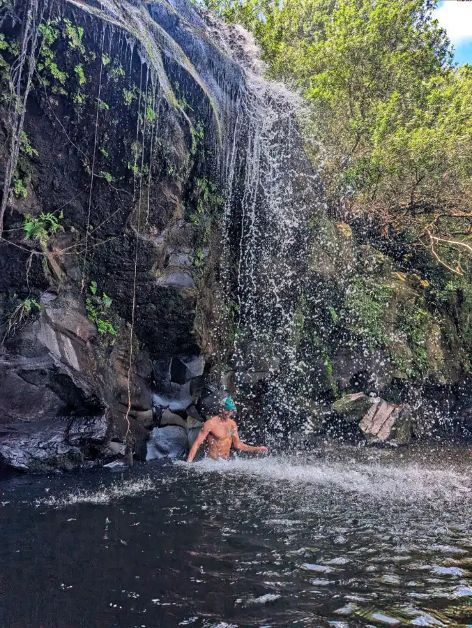 Rob Taylor swimming in waterfall with Hawaii Forest and Trail Kohala Waterfall Hiking Big Island Hawaii 3