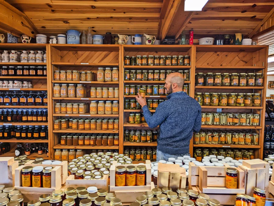 Rob Taylor with Jars of Pickels in Koepsel's Farm Market Door County Wisconsin 1