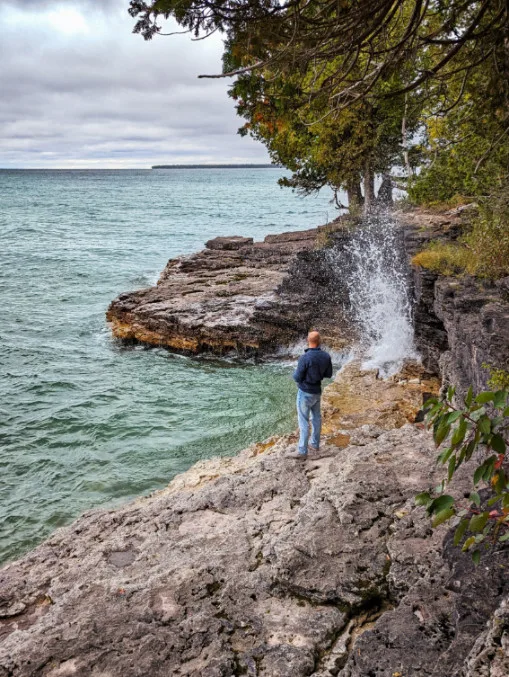 Rob Taylor with Waves Crashing at Shoreline of Lake Michigan at Cave Point County Park Door County Wisconsin 1