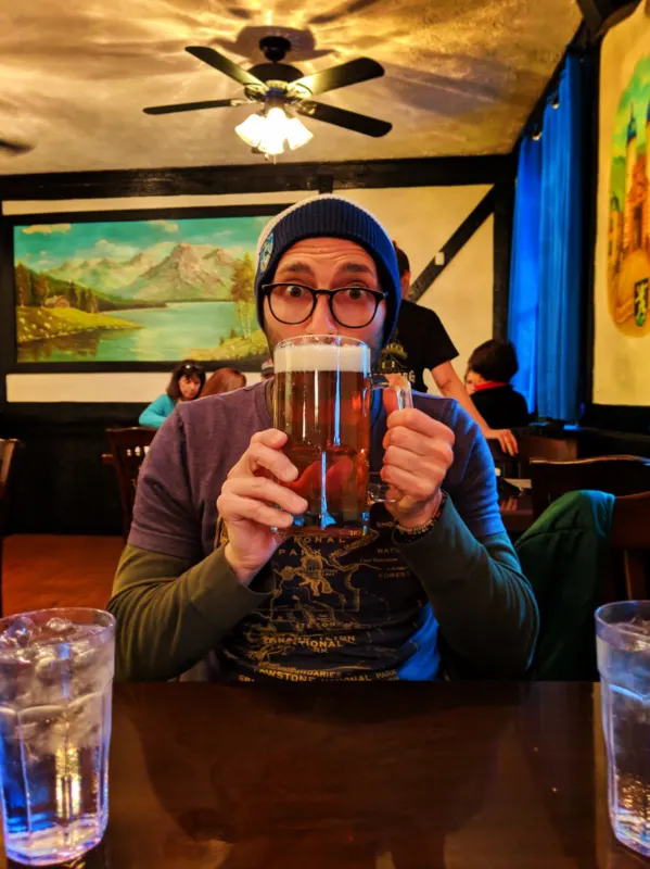 Rob Taylor with huge beer at Heidelberg restaurant in Alpine Helen North Georgia 1