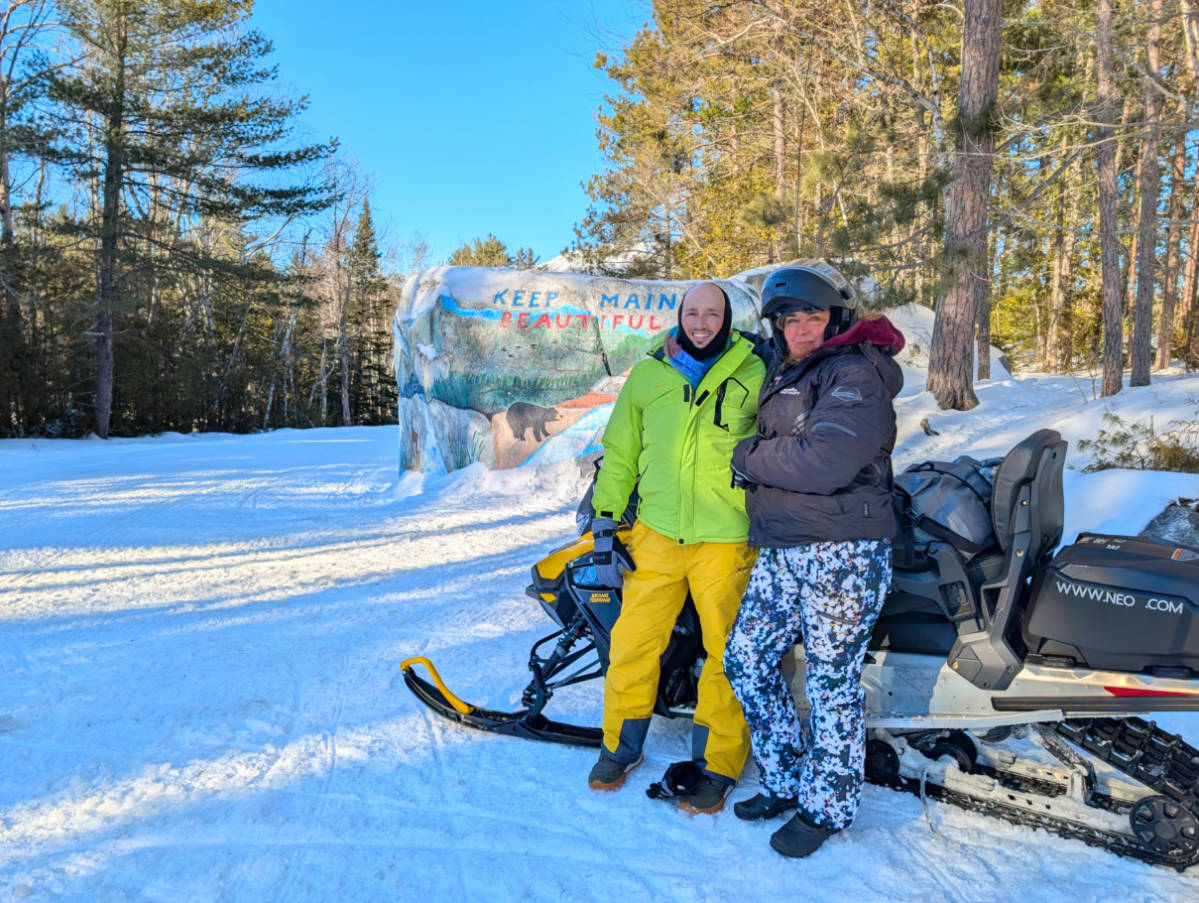 Rob and Kelly at Pockwockamus Rock on Snowmobile Tour with NEOC New England Outdoor Center Millinocket Maine 3