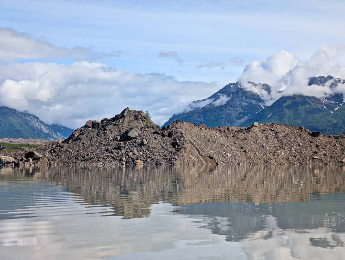 Rock covered Kennicott Glacier at Kennicott Glacial Lake Wrangell St Elias National Park Alaska