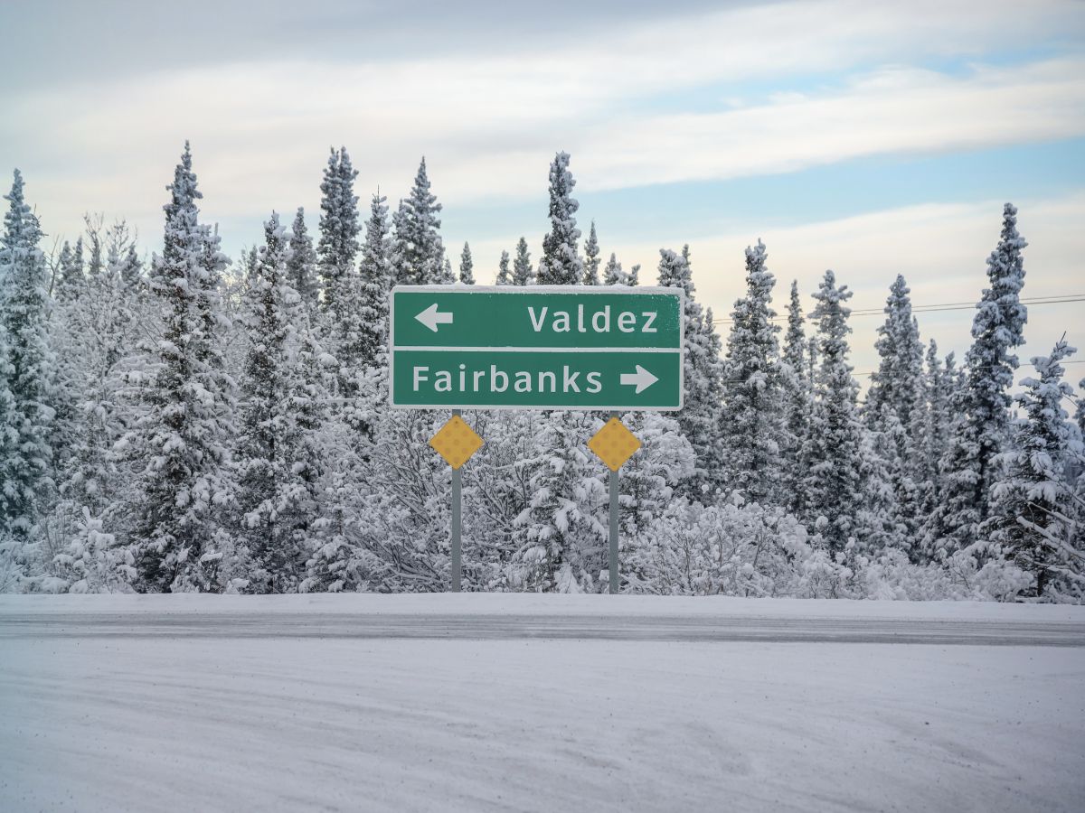 Snowy Directional Sign on Richardson Highway Valdez Alaska
