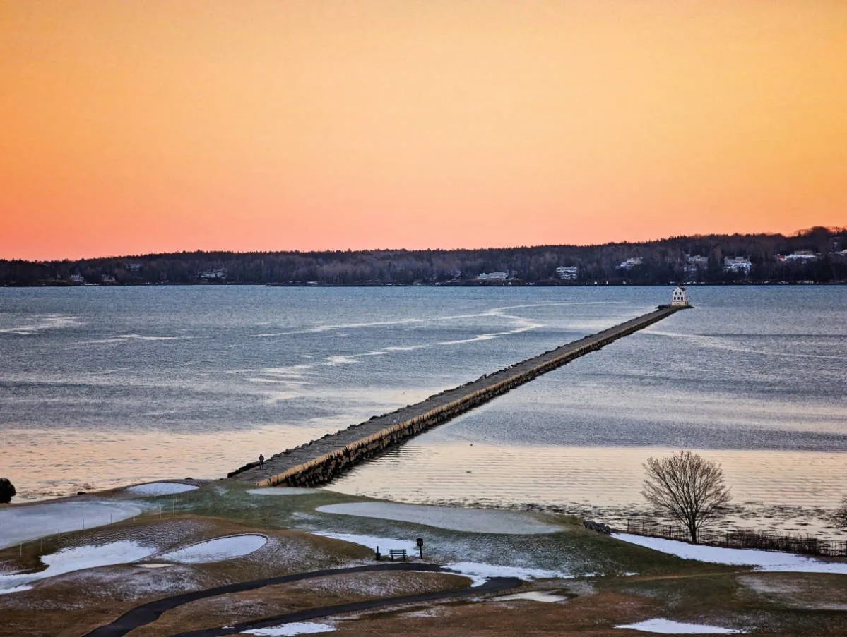 Sunset on Rockland Breakwater Lighthouse in Harbor from Samoset Resort at Rockland Maine 1