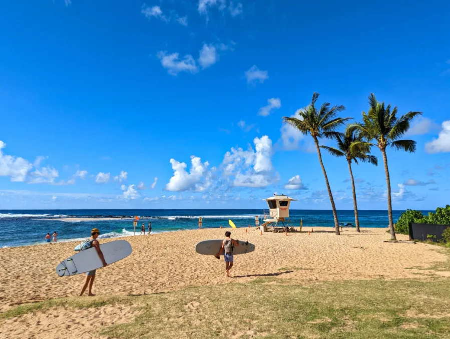 Surfers at Poipu Beach Koloa South Shore Kauai Hawaii 1