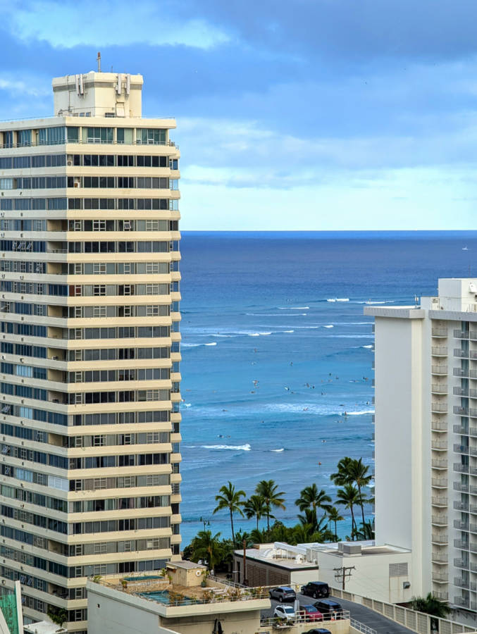 Surfers at Waikiki Beach view from Aston Sunset Hotel Honolulu Oahu Hawaii 1