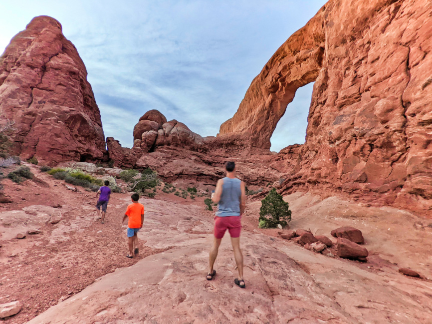 Taylor Family Hiking at Sunset at the Windows Arches National Park Utah 1