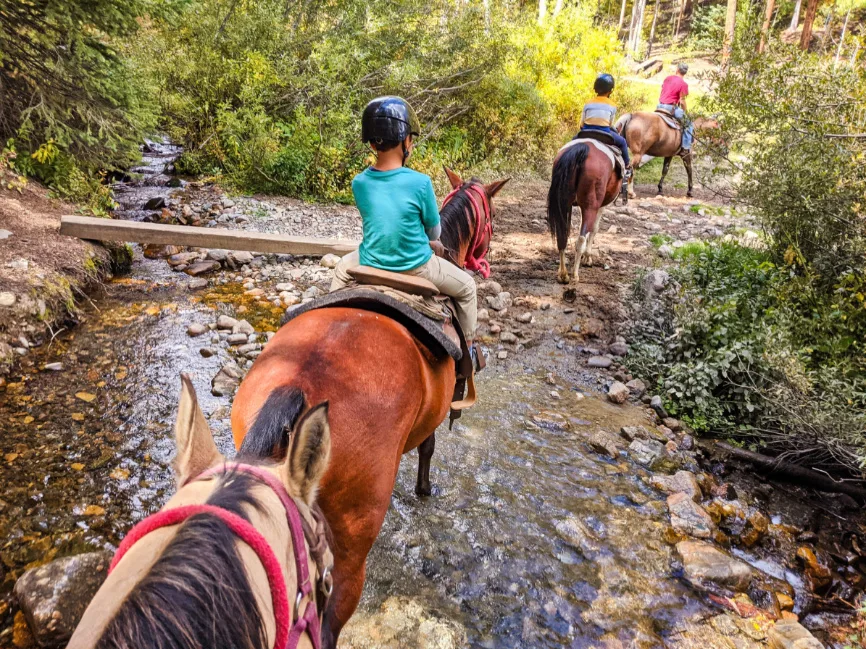Taylor Family Riding Horses at Breckenridge Stables in Summer Breckenridge Colorado 10