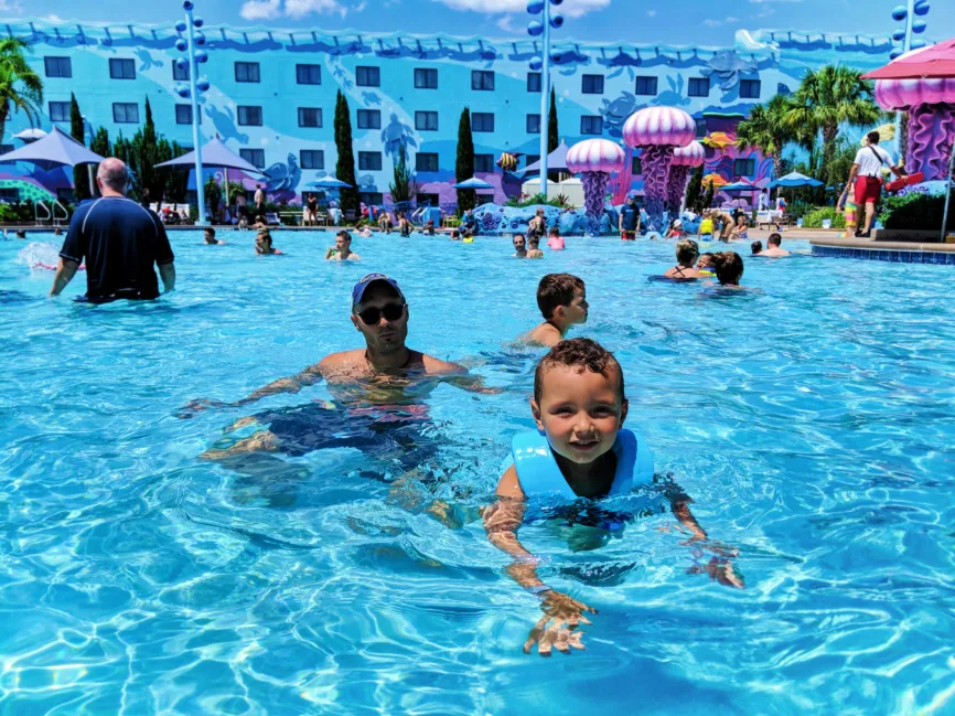 Taylor Family at Big Blue pool Art of Animation Resort Walt Disney World Orlando Florida 5