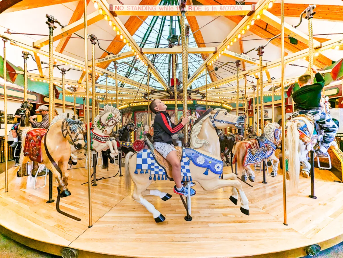 Taylor Family at Caras Park Carousel Missoula Montana 3