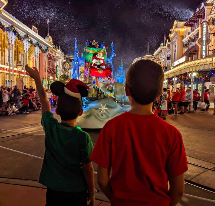 Taylor Family at Christmas Parade Mickeys Very Merry Christmas Party in Magic Kingdom Walt Disney World Florida 6