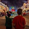 Taylor Family at Christmas Parade Mickeys Very Merry Christmas Party in Magic Kingdom Walt Disney World Florida 6