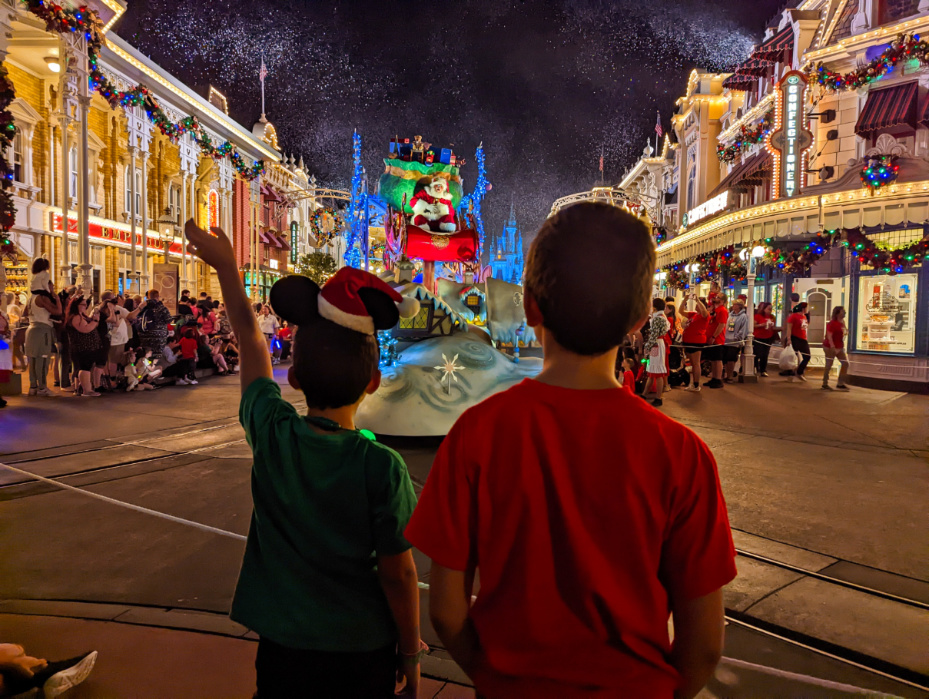 Taylor Family at Christmas Parade Mickeys Very Merry Christmas Party in Magic Kingdom Walt Disney World Florida 6