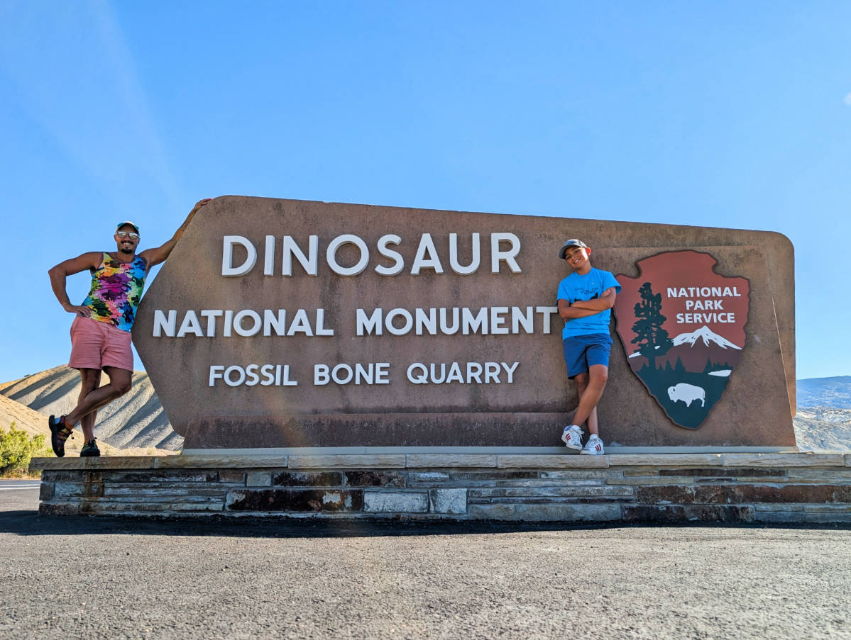Taylor Family at Entrance Sign to Dinosaur National Monument Vernal Utah 1