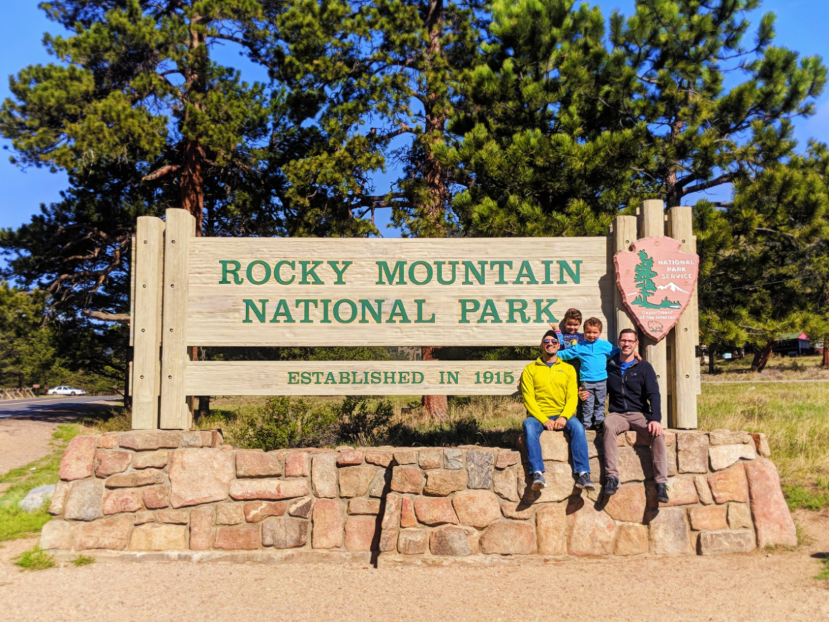 Taylor Family at Entrance Sign Rocky Mountain National Park Colorado 2