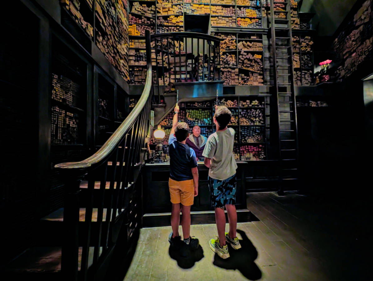 Taylor Family at Ollivanders Wand Shop in Hogsmeade Harry Potter at Islands of Adventure Universal Orlando Resort