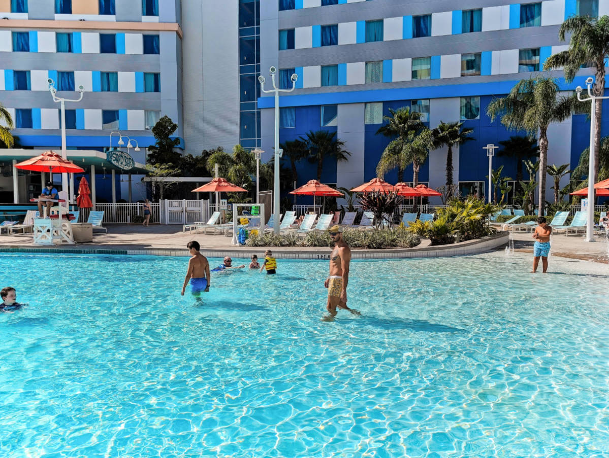 Taylor Family at Pool at Endless Summer Resort Surfside Inn and Suites Universal Orlando Resort