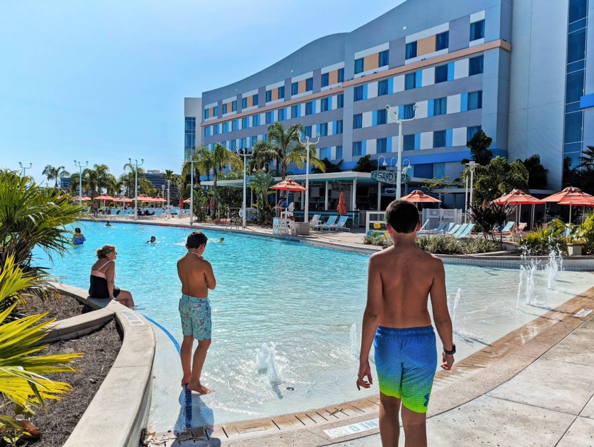 Taylor Family at Pool at Endless Summer Resort Surfside Inn and Suites Universal Orlando Resort