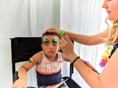 Taylor Family at San Diego Pride Festival facepainting in Childrens Garden Balboa Park SD California 2