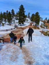 Taylor-Family-at-Sunrise-Point-Bryce-Canyon-National-Park-in-the-Snow-Utah-1-169x225.jpg
