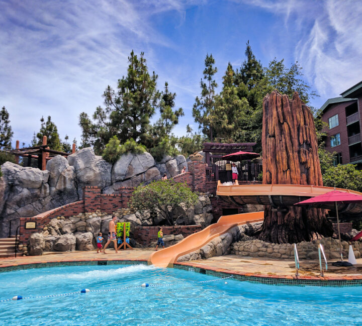 Taylor-Family-at-waterslide-pool-at-Disneys-Grand-Californian-Hotel-Disneyland-2-720x649.jpg