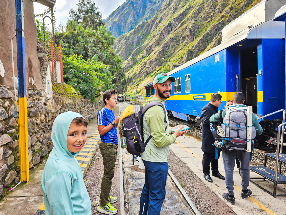 Taylor Family boarding Peru Rail for Machu Picchu in Ollantaytambo Andes Peru 1