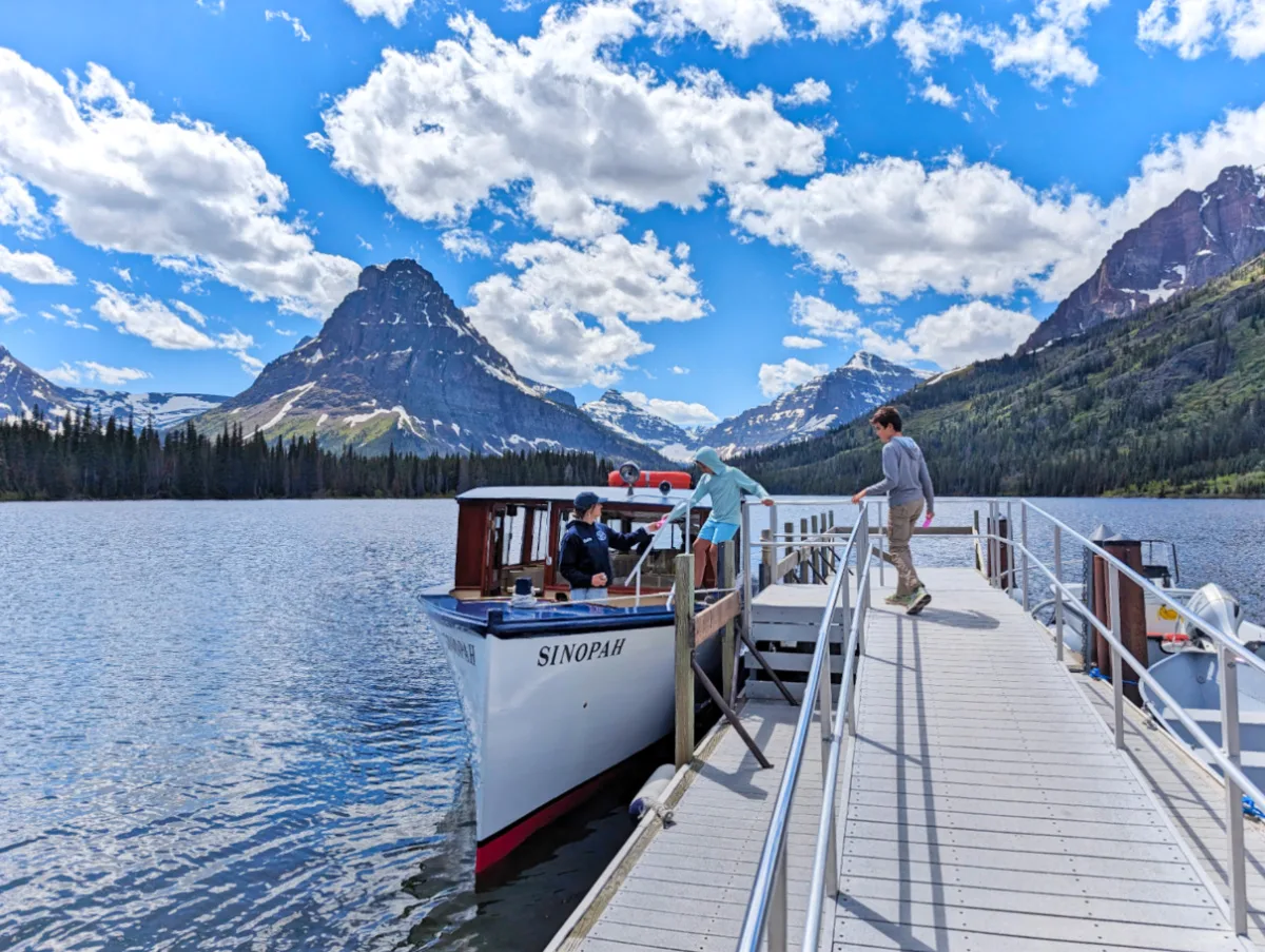 Taylor Family boarding Sinopah Glacier Park Boat Company tour at Two Medicine Lake Glacier National Park Montana 1