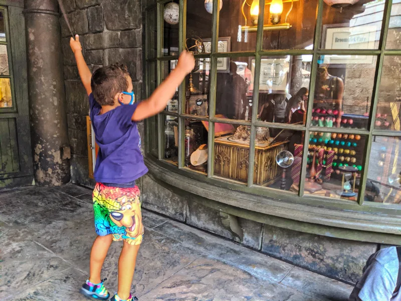 Taylor Family casting spells in Wizarding World of Harry Potter Universal Orlando 2020 3