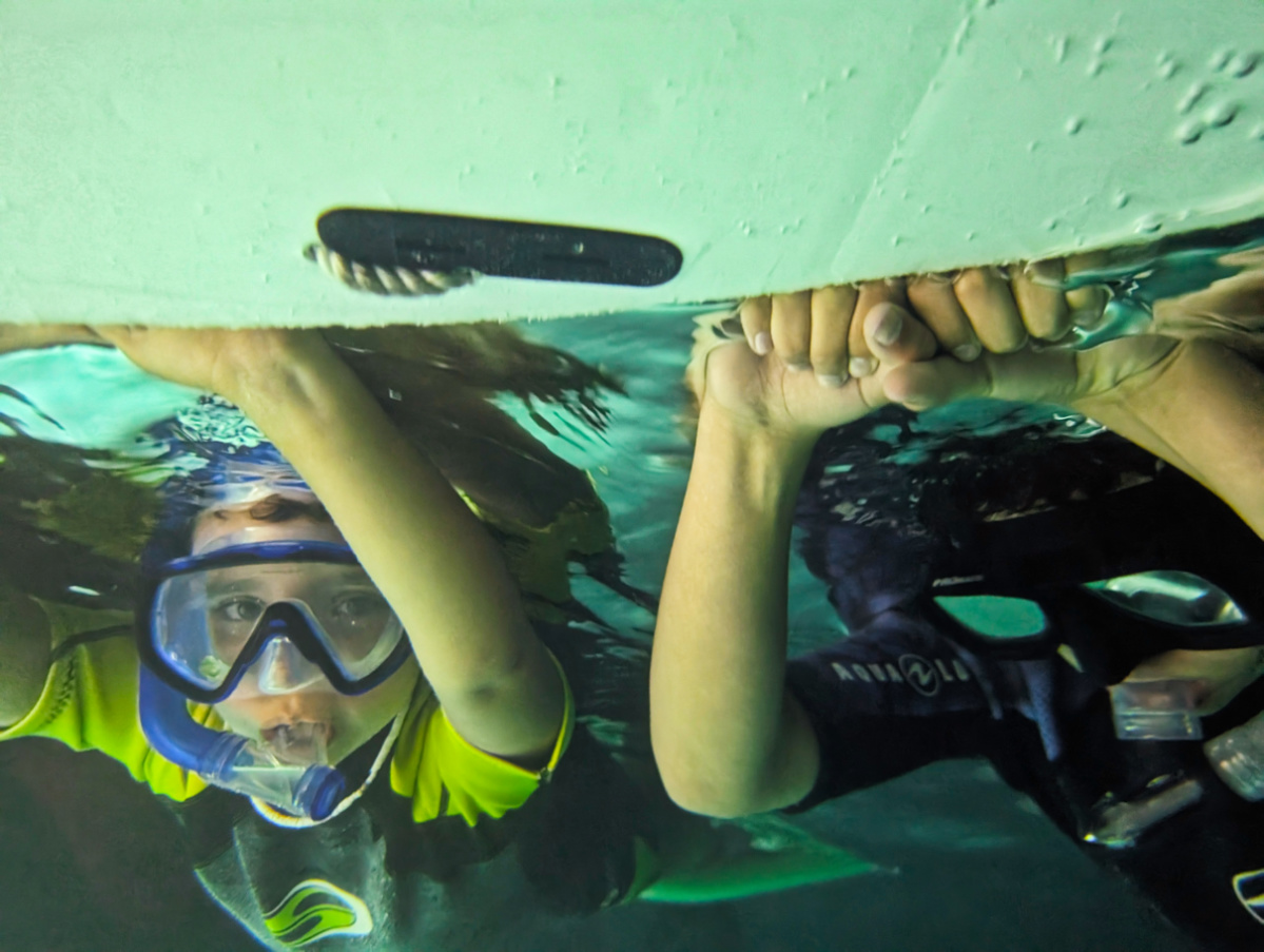 Taylor Family doing nighttime snorkel with manta ray with UnCruise Safari Explorer Hawaii 3