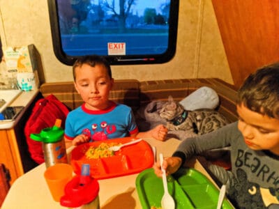 Taylor Family eating dinner in camper in Green River Utah cross country relocation 2020 1