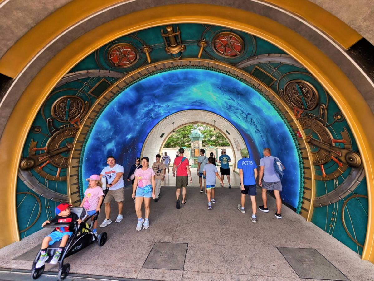 Taylor Family entering portal at Wizarding World of Harry Potter Ministry of Magic Epic Universe Universal Orlando 2