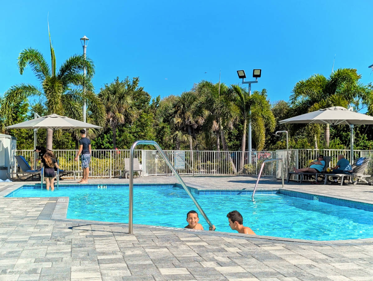 Taylor Family in Swimming Pool at Carlisle Inn Pinecraft Community Sarasota Florida 1