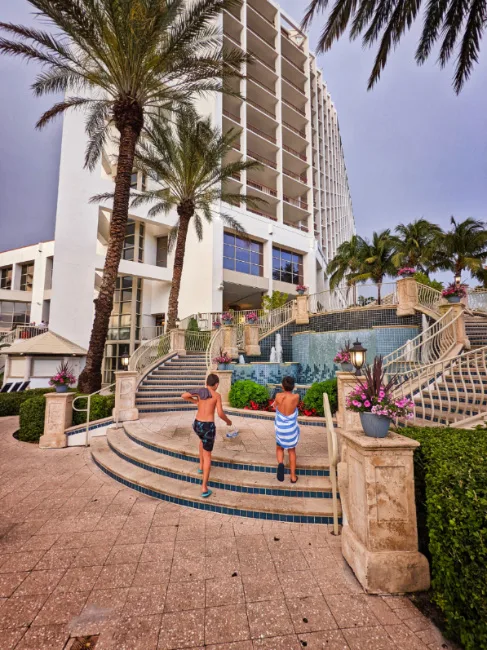 Taylor Family in Swimming Pool at Naples Grande Beach Resort Naples Florida 4