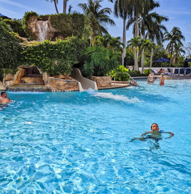 Taylor Family in Swimming Pool at Naples Grande Beach Resort Naples Florida 6